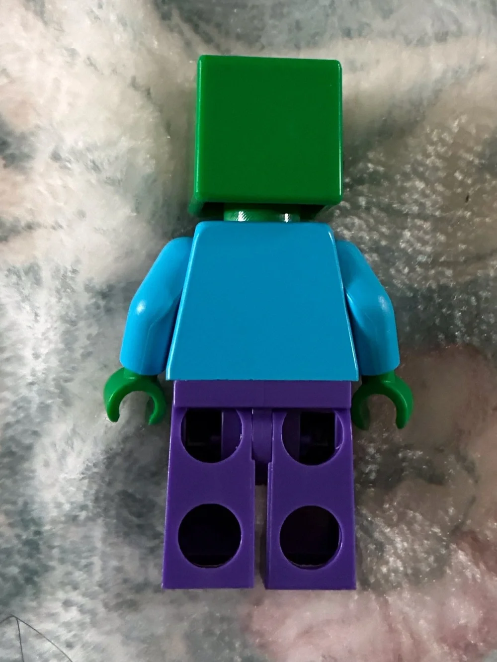 Green-Head Figure with Teal Torso & Purple Legs